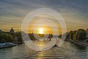 Yellow Sky at Golden Hour in Paris With Eiffel Tower Seine River and Bridges Trees