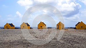 Yellow slave houses on the beach of Bonaire