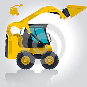 Yellow small digger loads building material.