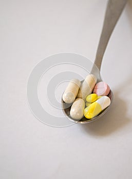 Yellow small round pills