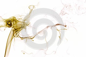 Yellow smoke on white background