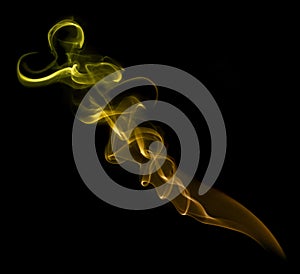 Yellow smoke wisp photo