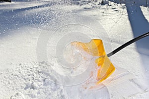 Yellow Snow Shovel Shoveling Fresh, Deep Powdery Snow