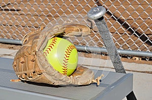 Yellow Softball, Bat, and Glove