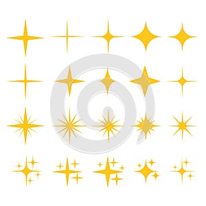 Yellow sparkling stars, shiny flashes of fireworks. Set of star elements with various glowing light effects photo