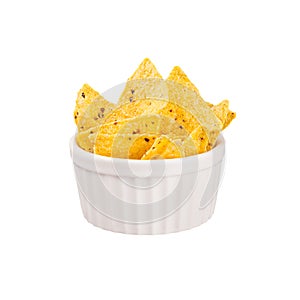 Yellow spicy triangles nachos in white ceramics bowl isolated on white background.