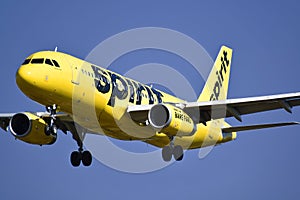 Yellow Spirit jet airliner landing at John Glenn International Airport, Columbus, Ohio