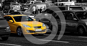 Yellow sports car in the city