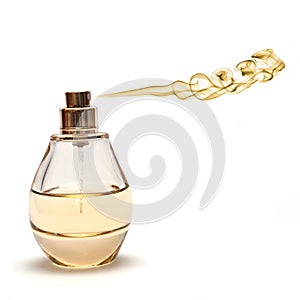 Yellow Spraying Parfume on White Background photo