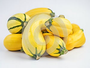 Yellow squash is isolated on white background. Fresh yellow zucchini on a white background