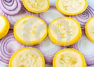 Yellow squash and purple onion slices