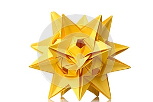 Yellow star origami figurine