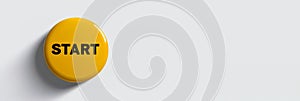 yellow 'Start' button on a pristine white surface, symbolizing a sunny initiation or beginning