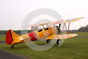 Yellow stearman biplane