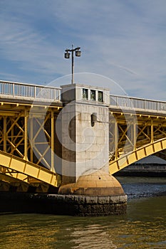 A yellow steel bridge