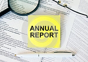 Yellow sticker with text Annual Report on financial docs
