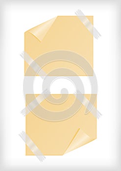 Yellow stickers with curled corner and scotch tape