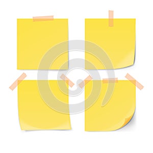 Yellow sticky note with adhesive tape isolated on white background.