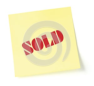 Yellow sticky note indicating item is sold