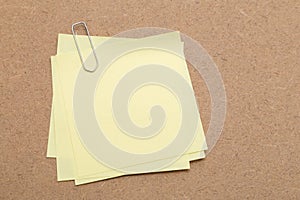 Yellow Sticky Note and paper clip