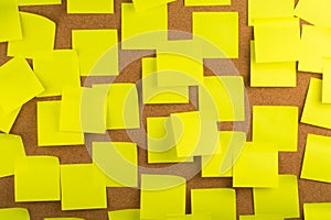 Yellow Sticky Notes on Bulletin Board