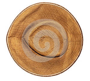 Yellow straw hat on white background top view.