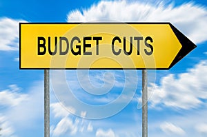 Yellow street concept budget cuts sign