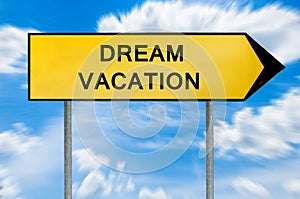 Yellow street concept dream vacation sign