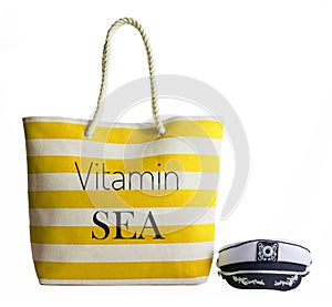 Yellow stripe beach bag and captains hat