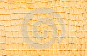 Yellow stylized crocodile skin background