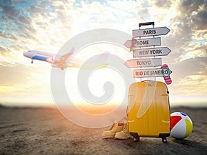 Yellow suitcase and signpost with travel destination, airplane.Tourism and  travel concept background