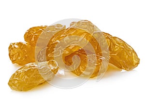 Yellow sultanas raisins close-up isolated on a white background.