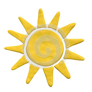 Yellow sun from plasticine on white background photo