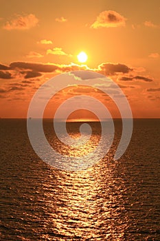 Yellow Sun Set in The Middle of The Ocean