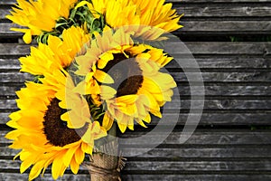 Yellow Sunflower Bouquet on Wooden Rustic Background