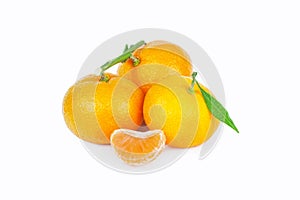 Yellow sweet isolated peeled and whole mandarin clementine tangerine on white copy space with leaf. Tangerines background concept