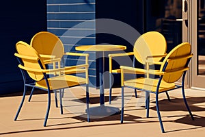 a yellow table with four chairs and a blue wall