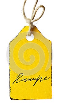 Yellow tag with handwritten text