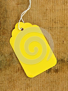 Yellow Tag on Wood