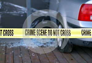 Yellow Tape Blocks a Crime Scene photo