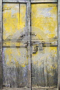 Yellow Tarnished Wood Door