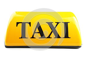 Yellow taxi roof sign on white background