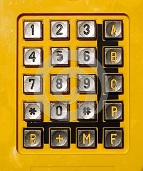 Yellow telephone keypad