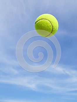 Yellow Tennis Ball in the Air