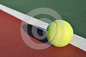 Yellow Tennis Ball on Court