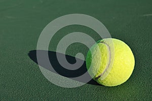 Yellow Tennis Ball on Court