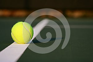 Yellow Tennis Ball On Court