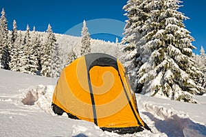 Yellow tent - close up, at alpine meadow