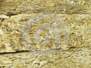 Yellow textured mineral wool background
