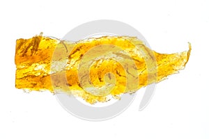 Yellow, textured, rectangular object on white background Potentially food, fabric, plastic or other material Single source